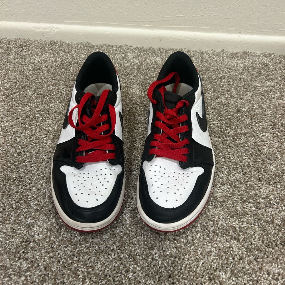 Nike Black and White Athletic Shoes with Red Laces